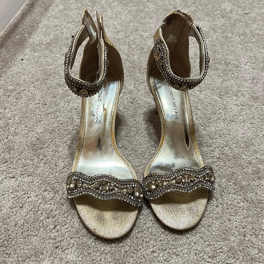 Gold Antonio Melani sparkly heels with a 2.5 inch heel